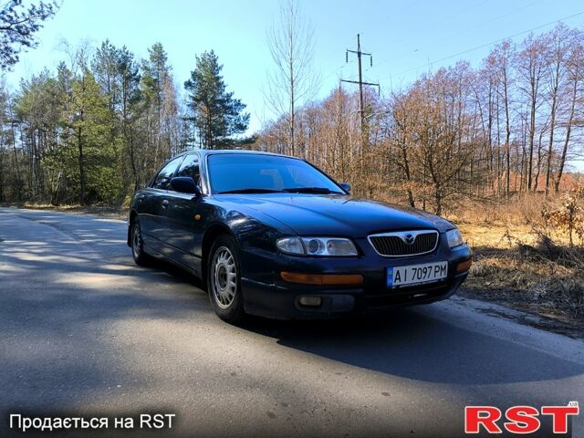 Синий Мазда Кседос 9, объемом двигателя 2.5 л и пробегом 300 тыс. км за 2500 $, фото 1 на Automoto.ua