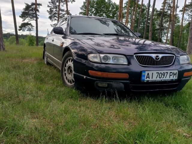 Синий Мазда Кседос 9, объемом двигателя 2.5 л и пробегом 305 тыс. км за 2219 $, фото 1 на Automoto.ua