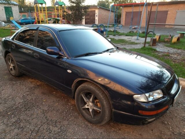 Синий Мазда Кседос 9, объемом двигателя 2.5 л и пробегом 295 тыс. км за 3399 $, фото 1 на Automoto.ua