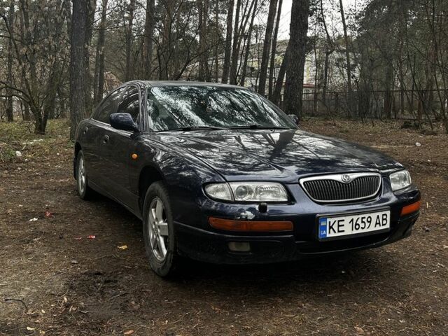 Синій Мазда Кседос 9, об'ємом двигуна 2.5 л та пробігом 397 тис. км за 2400 $, фото 1 на Automoto.ua