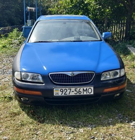 Синий Мазда Кседос 9, объемом двигателя 0 л и пробегом 370 тыс. км за 1004 $, фото 1 на Automoto.ua