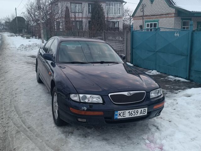 Синий Мазда Кседос 9, объемом двигателя 2.5 л и пробегом 350 тыс. км за 1650 $, фото 1 на Automoto.ua