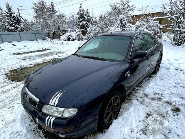 Синий Мазда Кседос 9, объемом двигателя 2.5 л и пробегом 0 тыс. км за 1700 $, фото 1 на Automoto.ua