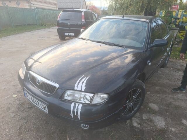 Синий Мазда Кседос 9, объемом двигателя 2.5 л и пробегом 294 тыс. км за 2300 $, фото 1 на Automoto.ua