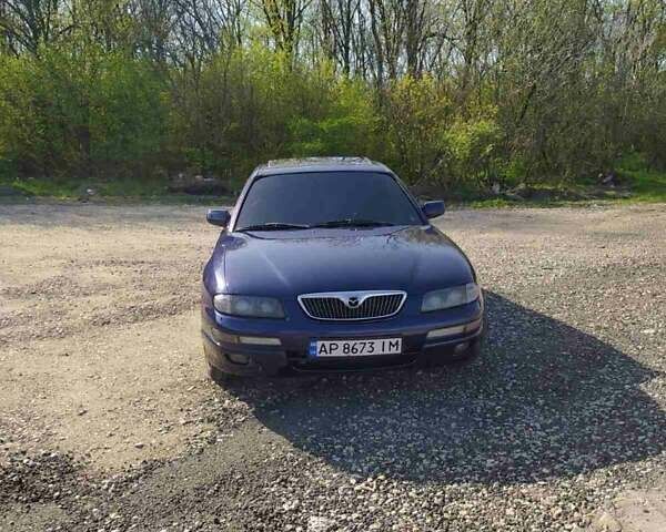Синий Мазда Кседос 9, объемом двигателя 2.5 л и пробегом 170 тыс. км за 4500 $, фото 1 на Automoto.ua