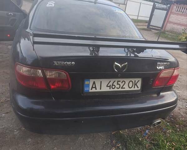 Синій Мазда Кседос 9, об'ємом двигуна 2.5 л та пробігом 294 тис. км за 2300 $, фото 1 на Automoto.ua