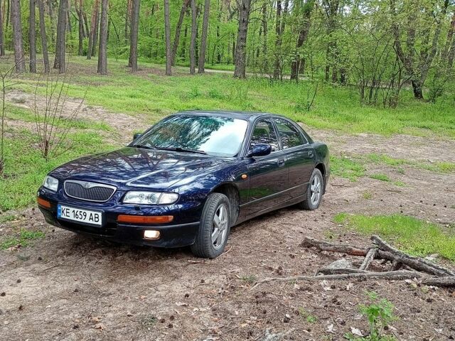 Синий Мазда Кседос 9, объемом двигателя 2.5 л и пробегом 400 тыс. км за 1700 $, фото 1 на Automoto.ua
