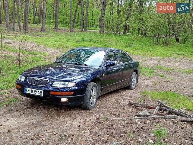 Синий Мазда Кседос 9, объемом двигателя 2.5 л и пробегом 400 тыс. км за 1800 $, фото 1 на Automoto.ua