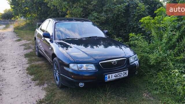Синий Мазда Кседос 9, объемом двигателя 2.5 л и пробегом 288 тыс. км за 2700 $, фото 1 на Automoto.ua