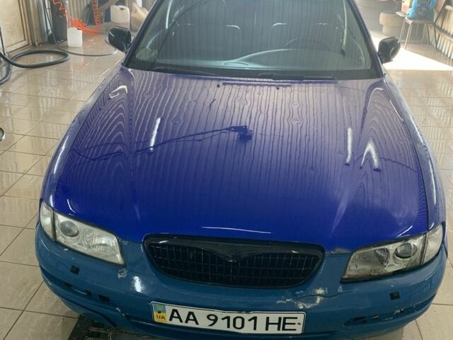 Синий Мазда Кседос 9, объемом двигателя 0 л и пробегом 200 тыс. км за 800 $, фото 1 на Automoto.ua