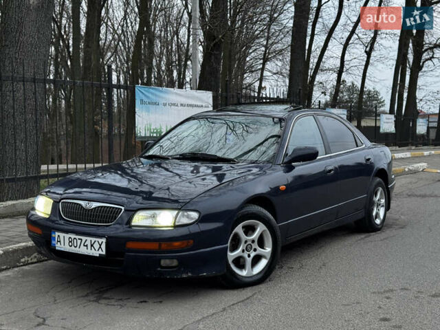 Синий Мазда Кседос 9, объемом двигателя 2.26 л и пробегом 185 тыс. км за 2200 $, фото 1 на Automoto.ua