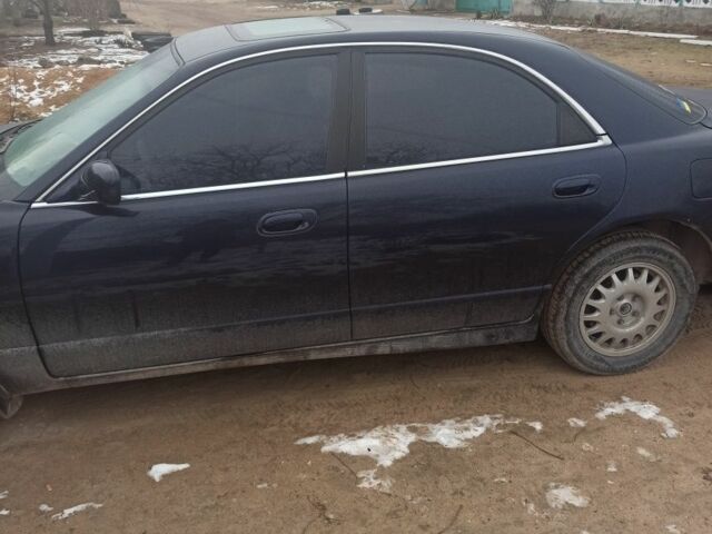 Синій Мазда Кседос 9, об'ємом двигуна 2.3 л та пробігом 322 тис. км за 2300 $, фото 1 на Automoto.ua