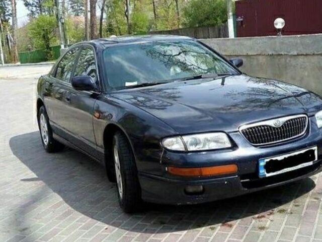 Синій Мазда Кседос 9, об'ємом двигуна 2 л та пробігом 220 тис. км за 1200 $, фото 1 на Automoto.ua