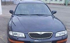 Синій Мазда Кседос 9, об'ємом двигуна 2.3 л та пробігом 300 тис. км за 2800 $, фото 1 на Automoto.ua