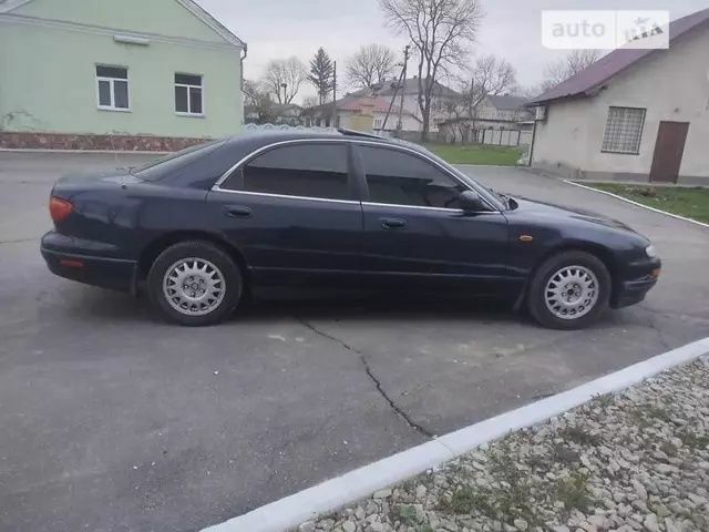 Мазда Кседос 9 1997 в Львове на Automoto.ua Синий Мазда Кседос 9, объемом двигателя 2.3 л и пробегом 300 тыс. км за 2200 $, фото 1 на Automoto.ua