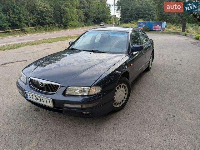 Синий Мазда Кседос 9, объемом двигателя 2.5 л и пробегом 249 тыс. км за 3950 $, фото 1 на Automoto.ua