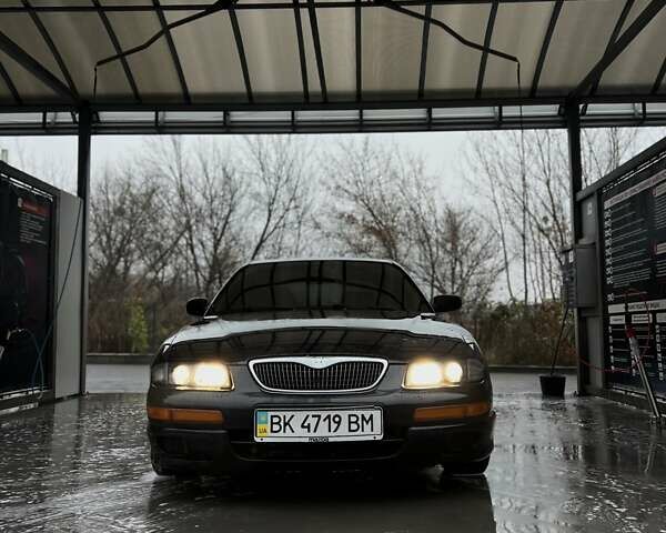 Зелений Мазда Кседос 9, об'ємом двигуна 2.5 л та пробігом 360 тис. км за 2700 $, фото 1 на Automoto.ua