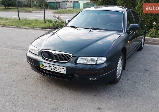 Зеленый Мазда Кседос 9, объемом двигателя 2.5 л и пробегом 270 тыс. км за 1730 $, фото 1 на Automoto.ua