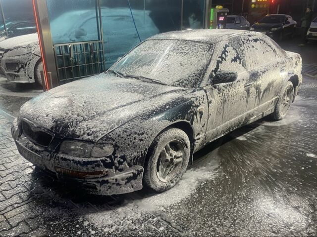 Зеленый Мазда Кседос 9, объемом двигателя 2 л и пробегом 417 тыс. км за 1600 $, фото 1 на Automoto.ua