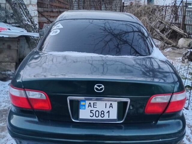 Зелений Мазда Кседос 9, об'ємом двигуна 2.5 л та пробігом 100 тис. км за 2600 $, фото 1 на Automoto.ua