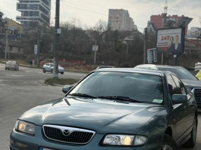 Зеленый Мазда Кседос 9, объемом двигателя 2.5 л и пробегом 300 тыс. км за 2300 $, фото 1 на Automoto.ua