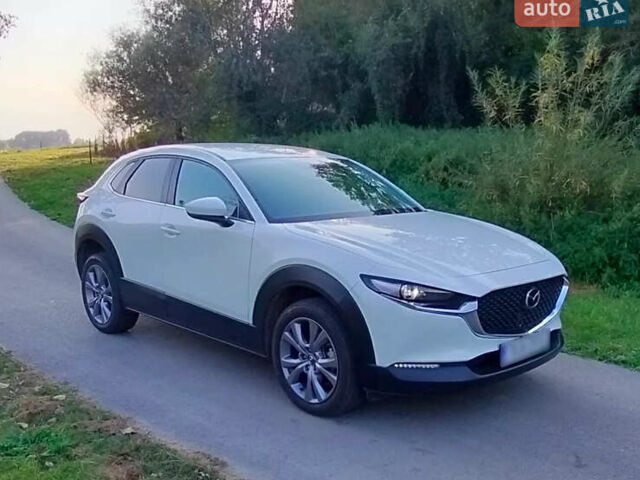 Белый Мазда CX-30, объемом двигателя 2 л и пробегом 115 тыс. км за 18300 $, фото 1 на Automoto.ua