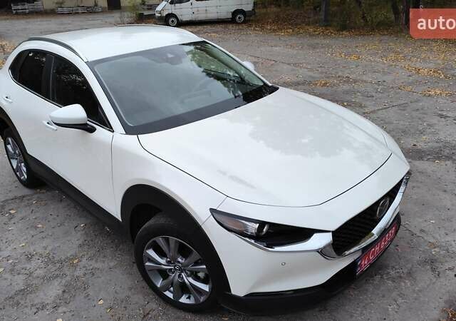 Белый Мазда CX-30, объемом двигателя 2.5 л и пробегом 106 тыс. км за 17400 $, фото 1 на Automoto.ua