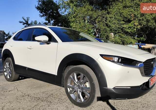 Белый Мазда CX-30, объемом двигателя 2.5 л и пробегом 106 тыс. км за 18800 $, фото 1 на Automoto.ua