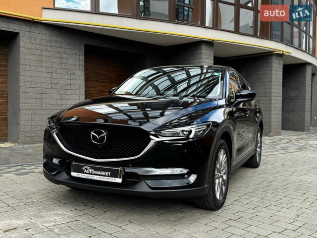 Черный Мазда CX-30, объемом двигателя 2.2 л и пробегом 140 тыс. км за 24500 $, фото 1 на Automoto.ua