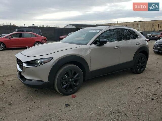 Коричневый Мазда CX-30, объемом двигателя 2.5 л и пробегом 20 тыс. км за 6000 $, фото 1 на Automoto.ua