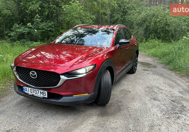 Красный Мазда CX-30, объемом двигателя 2.49 л и пробегом 104 тыс. км за 20999 $, фото 1 на Automoto.ua