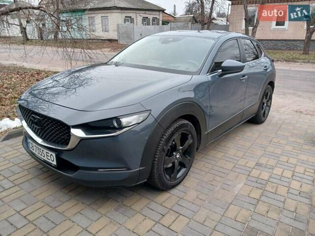 Серый Мазда CX-30, объемом двигателя 2 л и пробегом 105 тыс. км за 22500 $, фото 1 на Automoto.ua