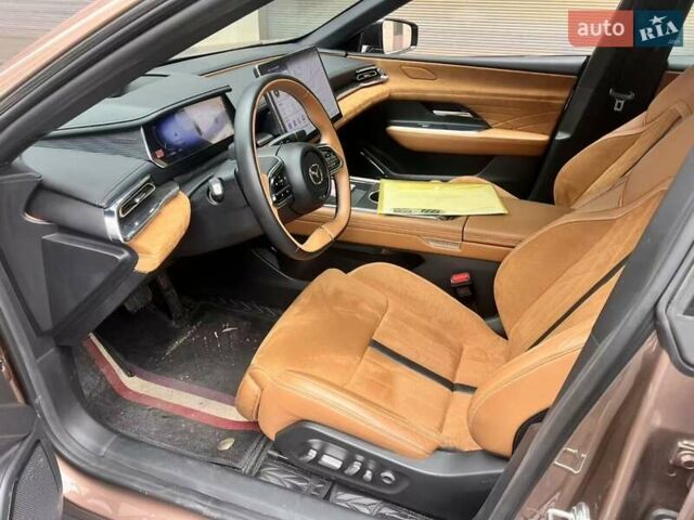 Коричневий Мазда EZ-6, об'ємом двигуна 1.5 л та пробігом 19 тис. км за 26200 $, фото 1 на Automoto.ua