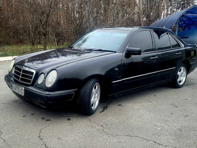 Черный Мерседес 200, объемом двигателя 2 л и пробегом 400 тыс. км за 2499 $, фото 1 на Automoto.ua