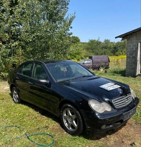 Чорний Мерседес 200, об'ємом двигуна 2.2 л та пробігом 200 тис. км за 2407 $, фото 1 на Automoto.ua