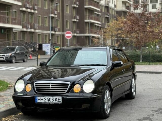 Черный Мерседес 200, объемом двигателя 2 л и пробегом 259 тыс. км за 3300 $, фото 1 на Automoto.ua