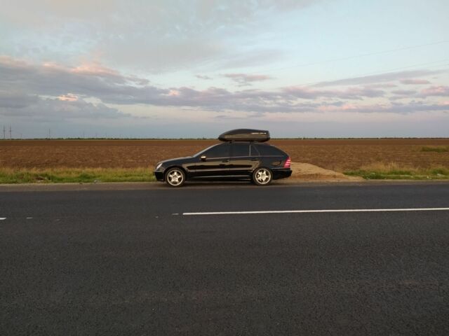 Чорний Мерседес 200, об'ємом двигуна 1.8 л та пробігом 261 тис. км за 6600 $, фото 1 на Automoto.ua