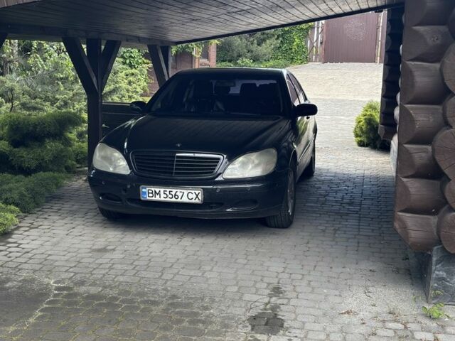Черный Мерседес 220, объемом двигателя 5 л и пробегом 392 тыс. км за 3577 $, фото 1 на Automoto.ua