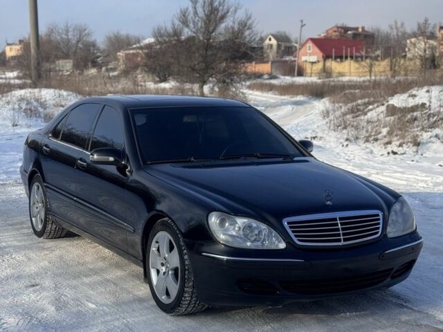 Черный Мерседес 220, объемом двигателя 5 л и пробегом 490 тыс. км за 5500 $, фото 1 на Automoto.ua