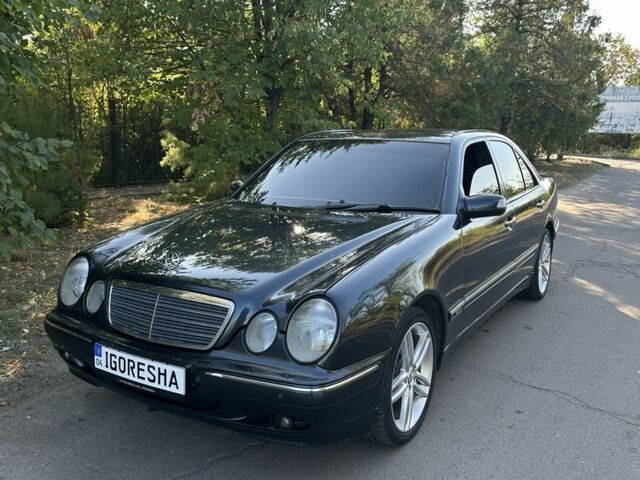 Чорний Мерседес 240, об'ємом двигуна 2.6 л та пробігом 498 тис. км за 6198 $, фото 1 на Automoto.ua