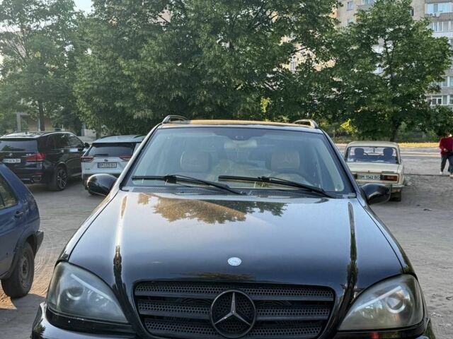 Чорний Мерседес 320, об'ємом двигуна 3.2 л та пробігом 160 тис. км за 8000 $, фото 1 на Automoto.ua
