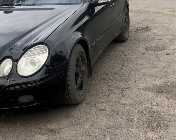 Черный Мерседес 320, объемом двигателя 3.2 л и пробегом 350 тыс. км за 2383 $, фото 1 на Automoto.ua