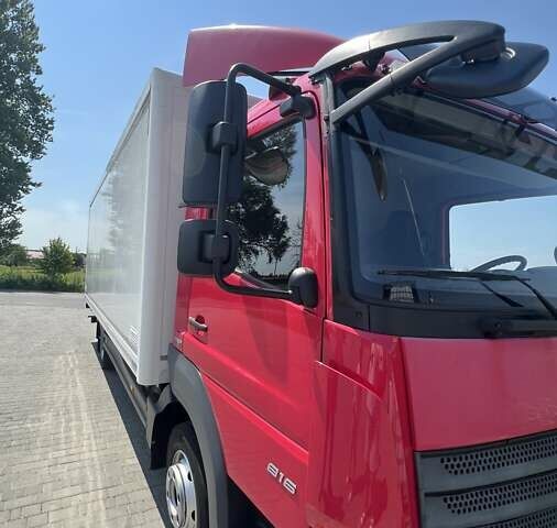 Красный Мерседес Атего, объемом двигателя 5.13 л и пробегом 337 тыс. км за 35500 $, фото 1 на Automoto.ua