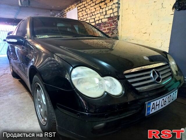 Чорний Мерседес Ц-Клас, об'ємом двигуна 2 л та пробігом 230 тис. км за 5500 $, фото 1 на Automoto.ua