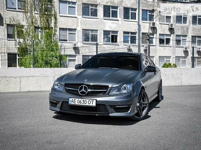 Чорний Мерседес Ц-Клас, об'ємом двигуна 6.2 л та пробігом 106 тис. км за 38922 $, фото 1 на Automoto.ua