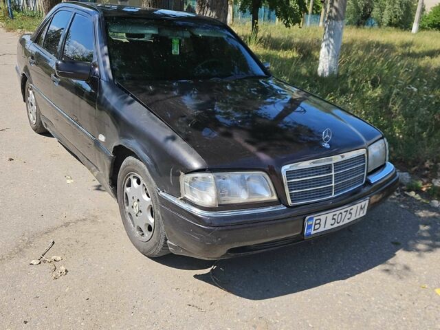Мерседес Ц-Клас 1996 у Харкові на Automoto.ua Чорний Мерседес Ц-Клас, об'ємом двигуна 2.3 л та пробігом 427 тис. км за 3200 $, фото 1 на Automoto.ua