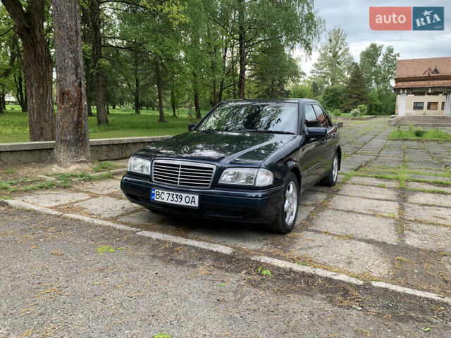 Чорний Мерседес Ц-Клас, об'ємом двигуна 2 л та пробігом 321 тис. км за 4500 $, фото 1 на Automoto.ua