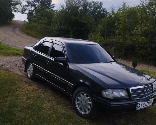 Чорний Мерседес Ц-Клас, об'ємом двигуна 2 л та пробігом 380 тис. км за 2999 $, фото 1 на Automoto.ua