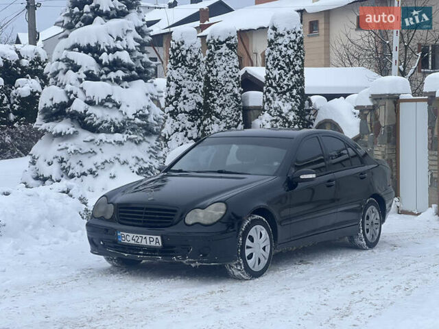 Черный Мерседес Ц-Класс, объемом двигателя 2.15 л и пробегом 429 тыс. км за 2650 $, фото 1 на Automoto.ua