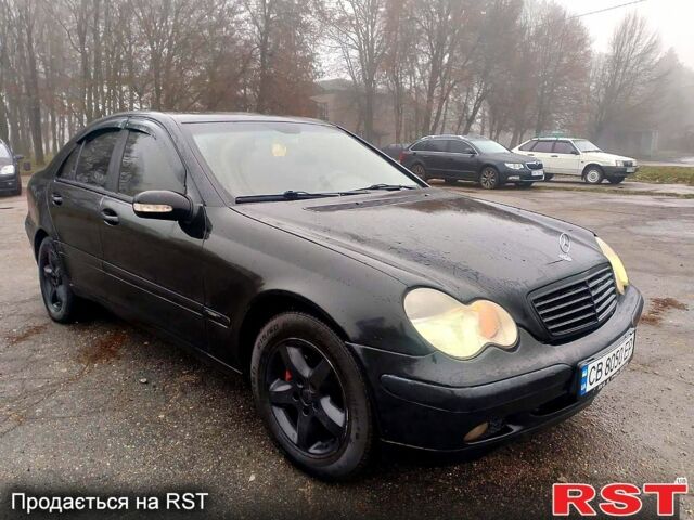 Черный Мерседес Ц-Класс, объемом двигателя 1.8 л и пробегом 320 тыс. км за 4999 $, фото 1 на Automoto.ua